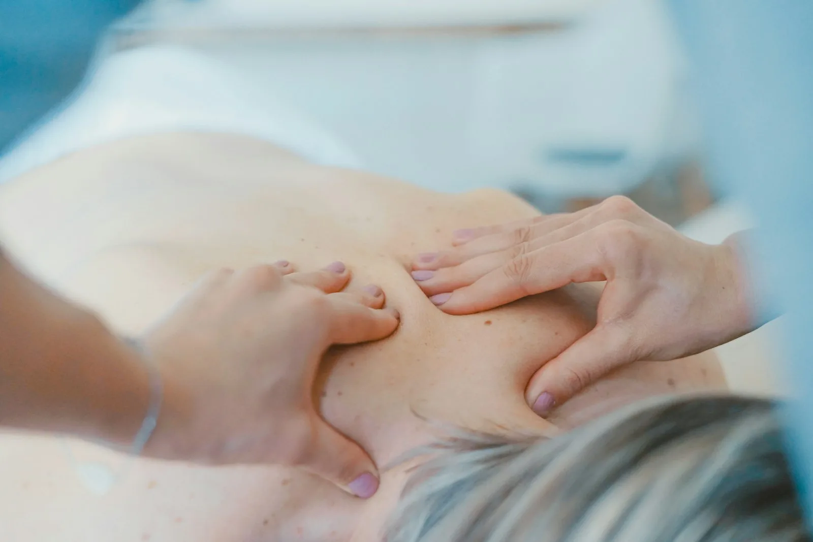 Relaxing massage with warm oils and soft lighting at a Las Palmas studio